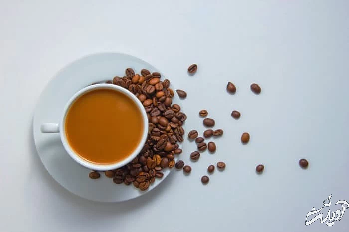 مضرات کافئین برای استخوان ها لیوان قهوه